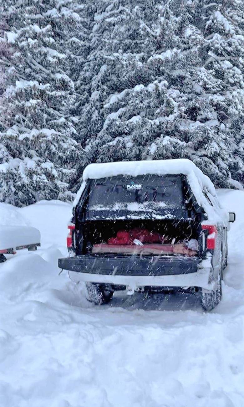 Ford F-150 Lightning Electric Winter Camping Trips in Montana. Used Rivian Charging Station lightningsnowcampin