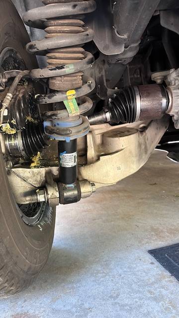 Ford F-150 Lightning Replaced:  Rear Driver DRIVE AXLE...  under warranty @ 49,000 miles new drive axle assembly installed