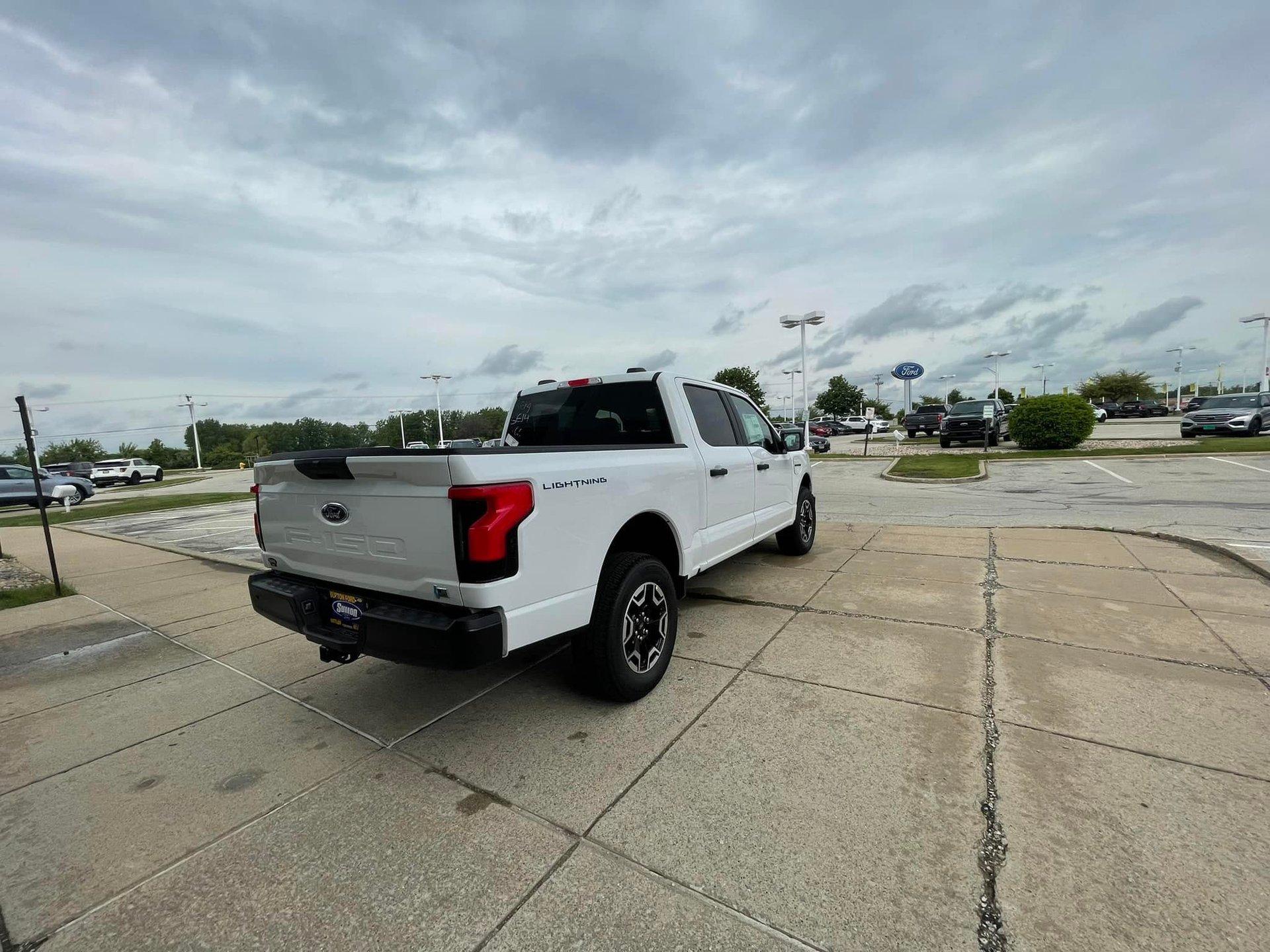 Ford F-150 Lightning White Lightning Pro Demo Mannequin @ Sutton Ford Oxford White F150 Lightning Pro 2