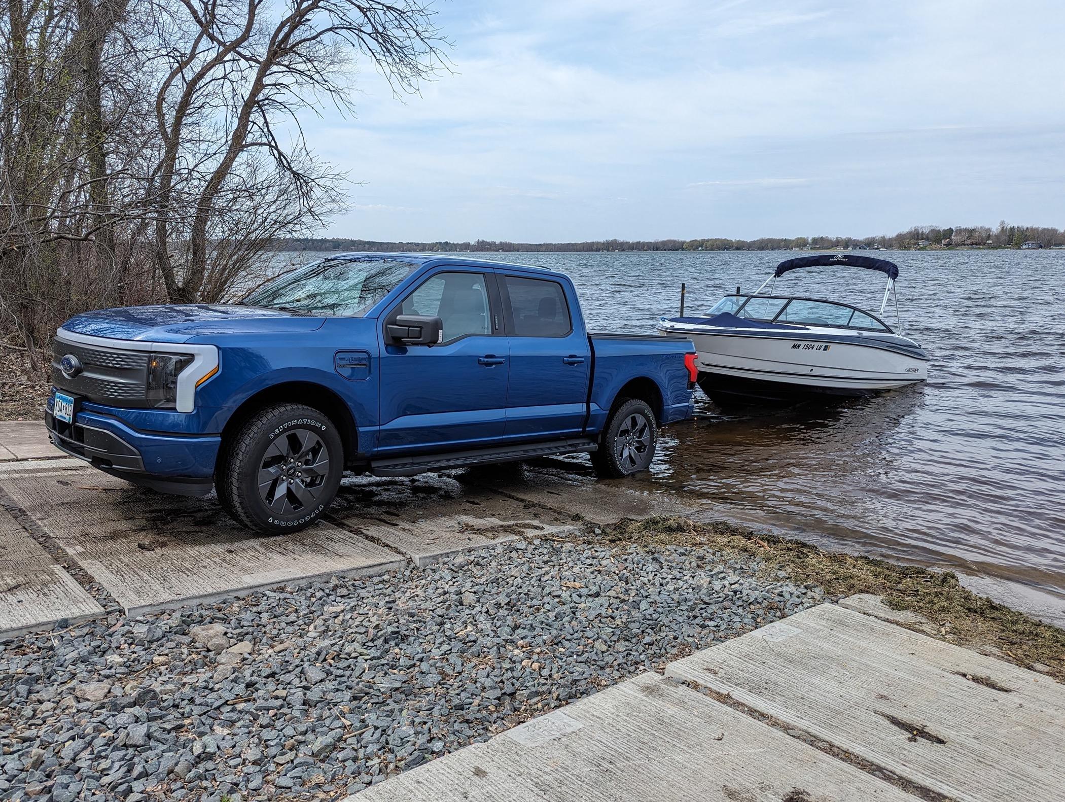 Ford F-150 Lightning Towing a 5,500 lbs boat without Max Tow... it's been great! PXL_20240422_162532094_Original