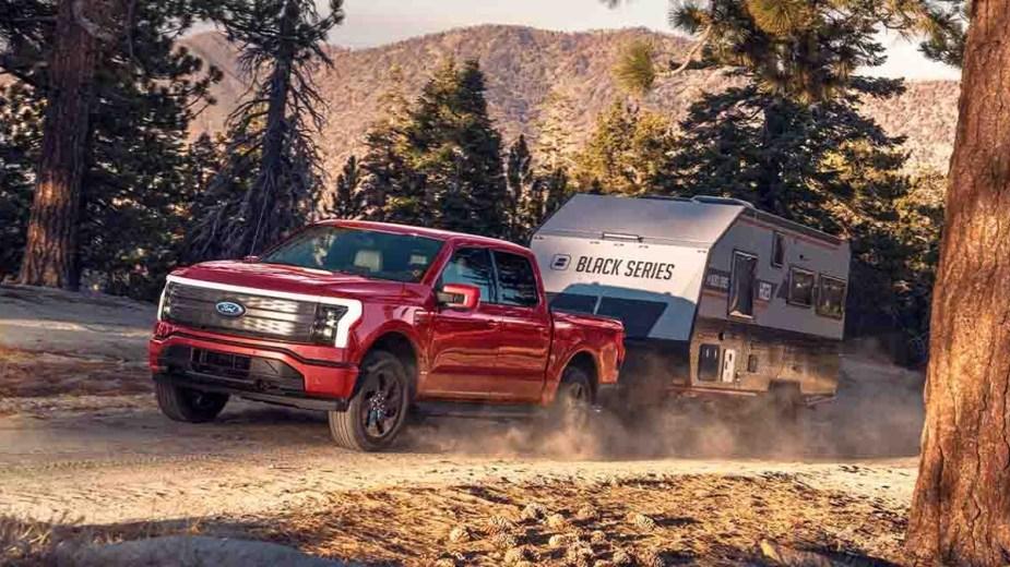 Ford F-150 Lightning Farley & Ford Execs Traveling the American West in F-150 Lightning Red-Ford-F-150-Lightning-Towing-a-Trailer