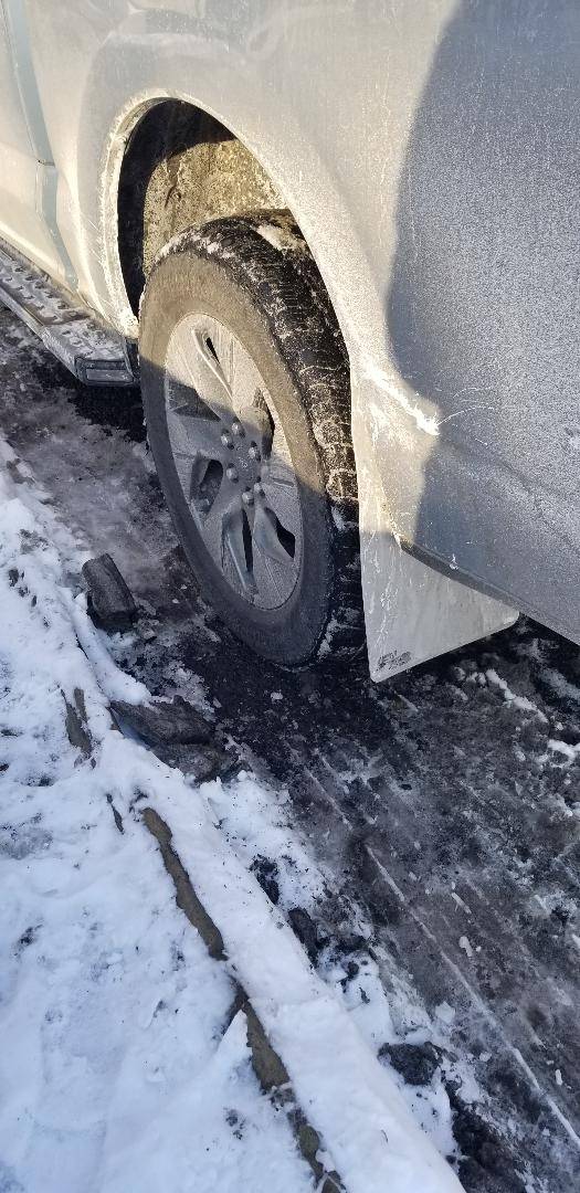 Ford F-150 Lightning Snow review - RokBlokz aftermarket mud flaps. RocBlox pic 3 - rear from back