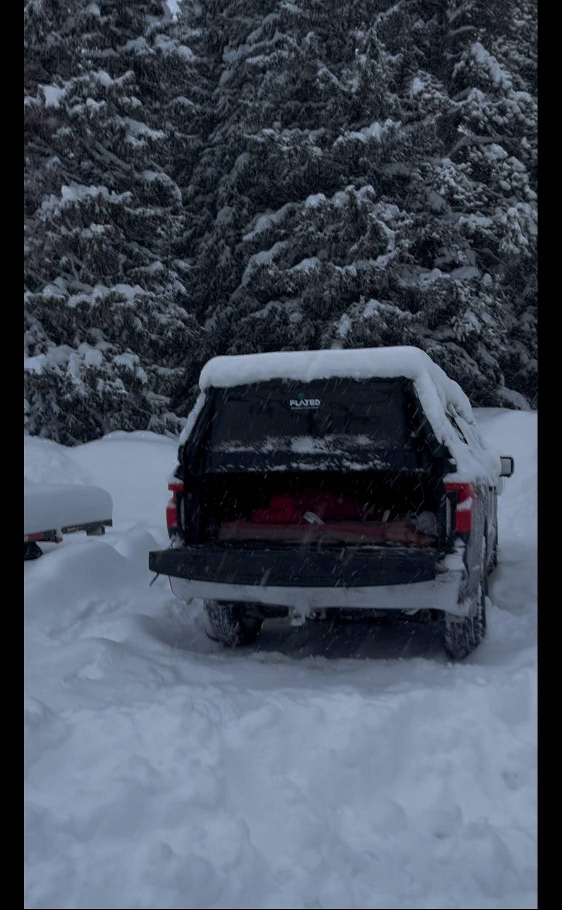 Ford F-150 Lightning Electric Winter Camping in Montana snowy