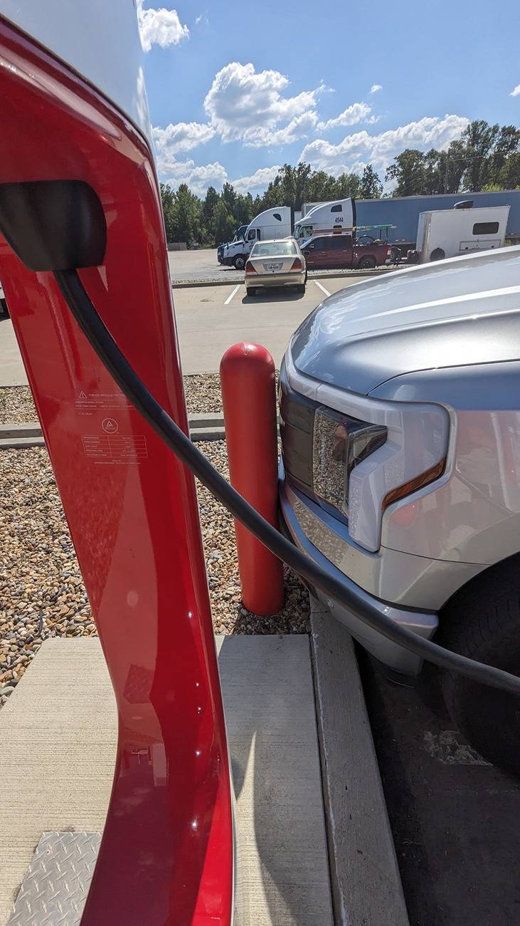 Ford F-150 Lightning Tesla adds longer cables and more to Superchargers as non-Tesla EVs complicate things tesla New Boston TX  SHORT CORD