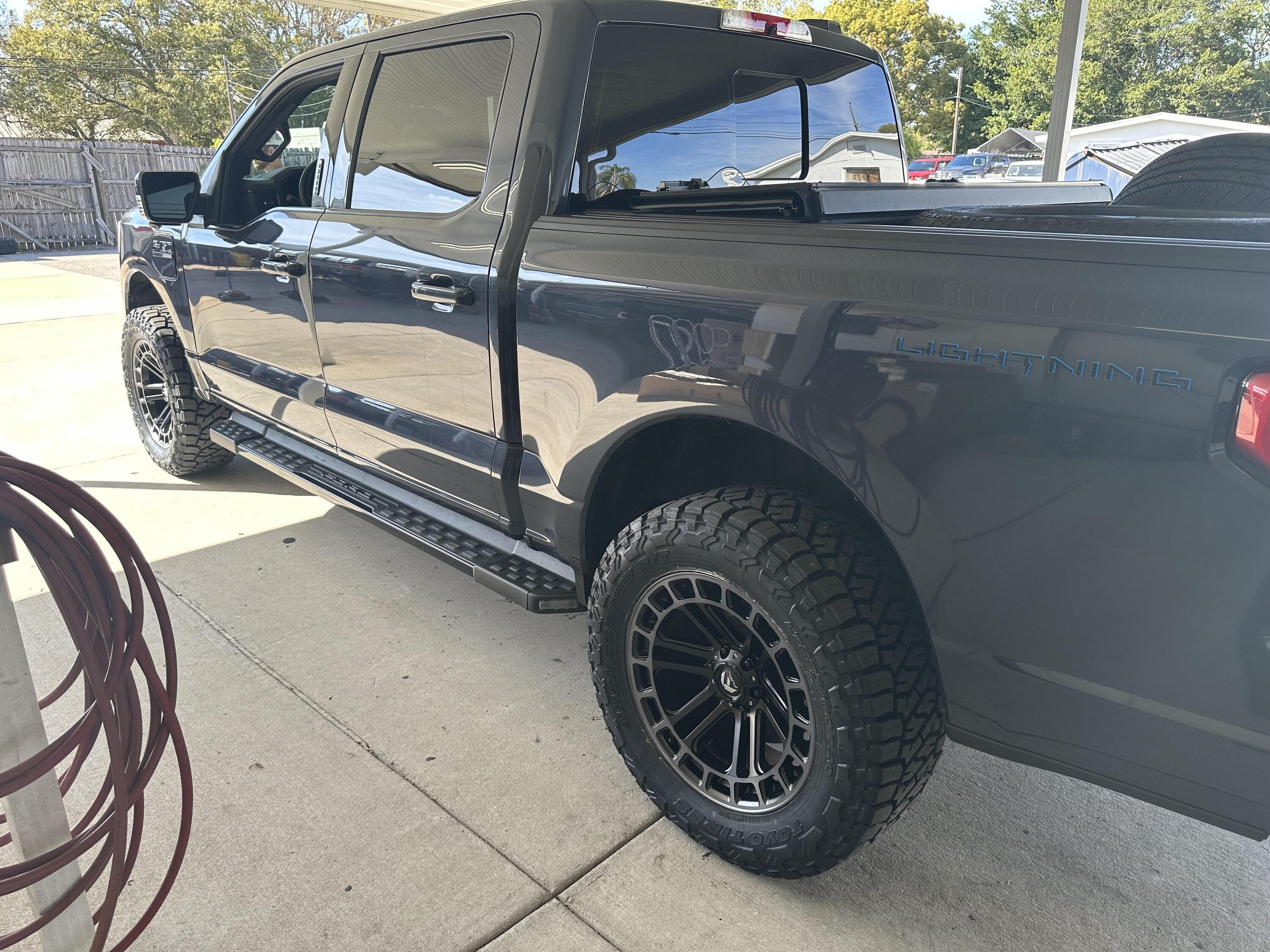 Ford F-150 Lightning 2023 Star White Lightning Lariat Build -- Leveled, Nittos, Vorrsteiner VR601s, Tint truck