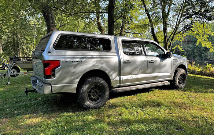 Ranch Sierra Topper Bed Cap installed on Lightning XLT ER.  No noticeable efficiency changes so far